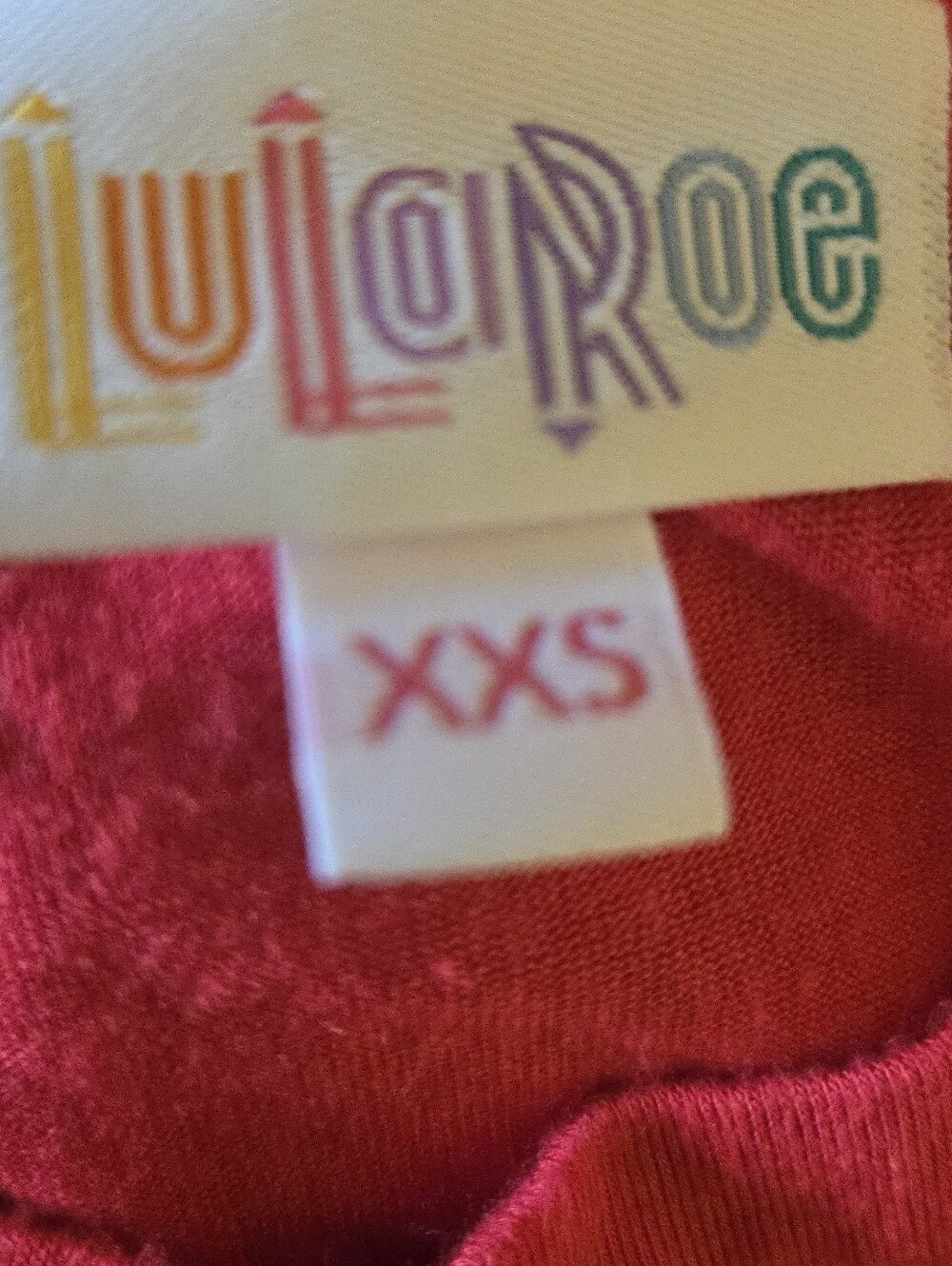 LuLaRoe Red Top with Mint Green Sleeves. Rainbow Logo Tag